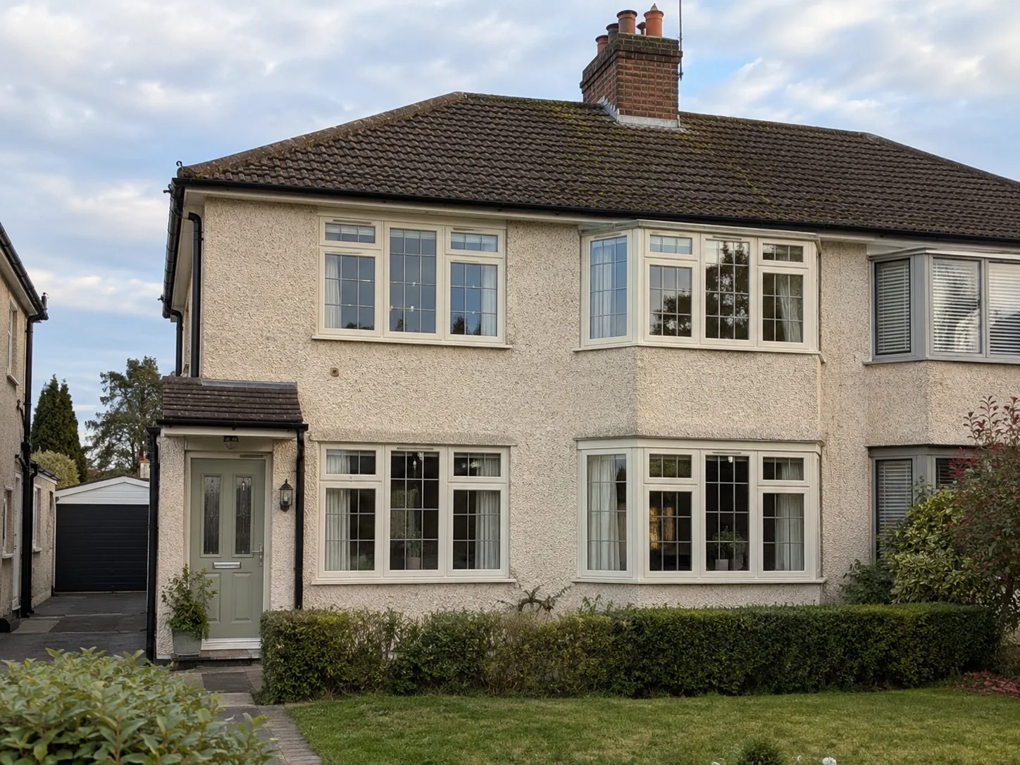 White casement window in a lived-in kitchen
