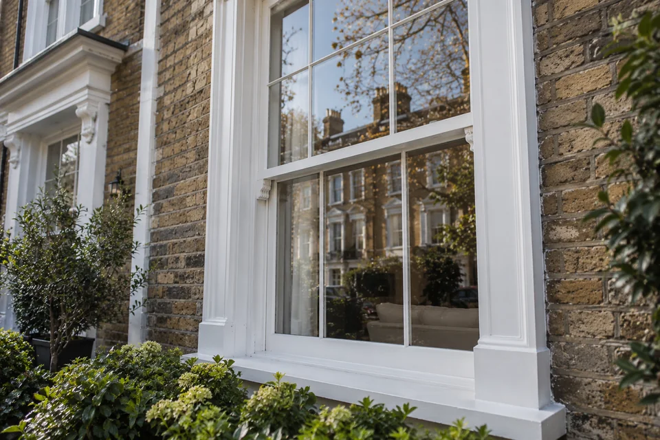 White double glazed timber sash window in a period home