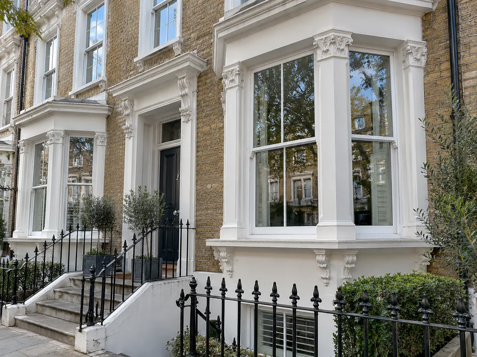 Replacement timber sash windows in a bay-fronted period home