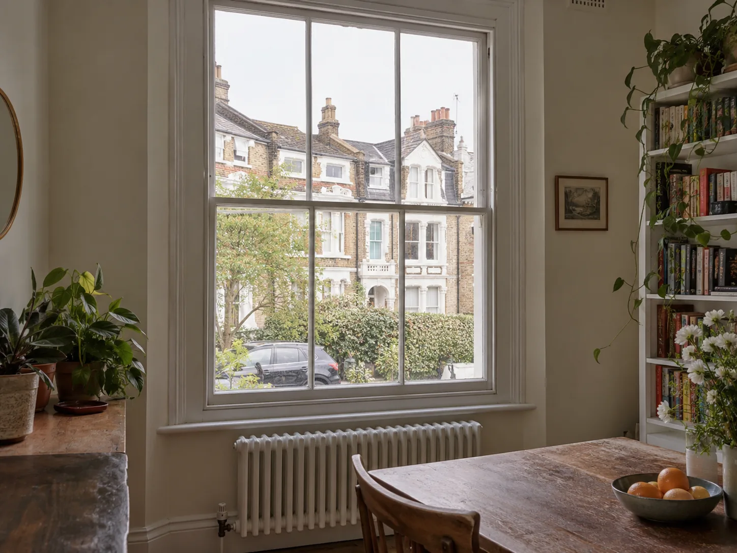 Dining room with a large timber sash window